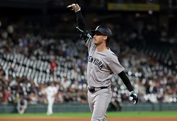 New York Yankees left fielder Cody Bellinger celebrates after driving in a run on a single in the 11th inning of a game against the Chicago White Sox at Rate Field in Chicago on Aug. 30, 2025. (Chris Sweda/Chicago Tribune)