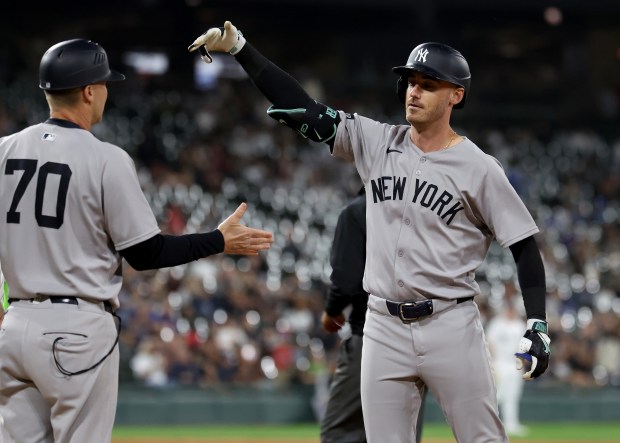 New York Yankees left fielder Cody Bellinger celebrates after driving in a run on a single in the 11th inning of a game against the Chicago White Sox at Rate Field in Chicago on Aug. 30, 2025. (Chris Sweda/Chicago Tribune)