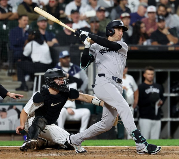 New York Yankees left fielder Cody Bellinger hits a double in the fifth inning of a game against the Chicago White Sox at Rate Field in Chicago on Aug. 28, 2025. (Chris Sweda/Chicago Tribune)