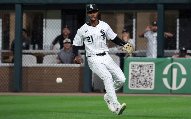 Chicago White Sox right fielder Michael A. Taylor fields a ball that went for a run-scoring double for New York Yankees shortstop Anthony Volpe in the 11th inning of a game at Rate Field in Chicago on Aug. 30, 2025. (Chris Sweda/Chicago Tribune)