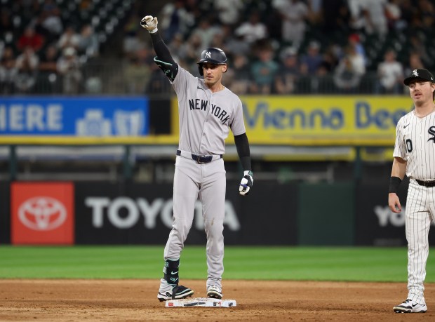 New York Yankees left fielder Cody Bellinger celebrates at second base after hitting a double in the fifth inning of a game against the Chicago White Sox at Rate Field in Chicago on Aug. 28, 2025. (Chris Sweda/Chicago Tribune)