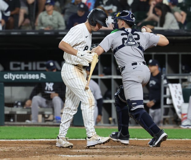 Chicago White Sox catcher Kyle Teel walks to the dugout after striking out in the seventh inning of a game against the New York Yankees at Rate Field in Chicago on Aug. 28, 2025. (Chris Sweda/Chicago Tribune)