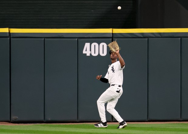 Chicago White Sox center fielder Michael A. Taylor catches a ball that went for a run-scoring sacrifice fly for New York Yankees shortstop Anthony Volpe in the eighth inning of a game at Rate Field in Chicago on Aug. 28, 2025. (Chris Sweda/Chicago Tribune)