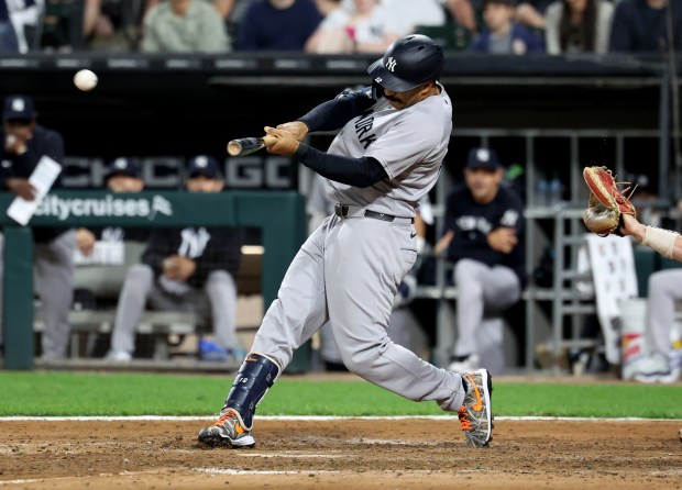 New York Yankees center fielder Trent Grisham hits a two-run home run in the eighth inning of a game against the Chicago White Sox at Rate Field in Chicago on Aug. 28, 2025. (Chris Sweda/Chicago Tribune)
