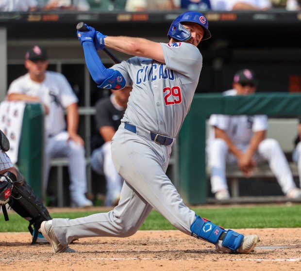 Chicago Cubs first base and lead off hitter Michael Busch (29) strikes out swinging in the Chicago White Sox pitcher Sean Burke (59) pitches in the third inning against the Chicago Cubs on July 27, 2025, at Rate Field in Chicago. Busch went 0-5 and the Cubs won 5-4 (Stacey Wescott/Chicago Tribune)