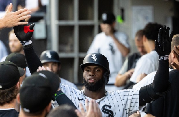 Chicago White Sox center fielder Luis Robert Jr. (88) celebrates...
