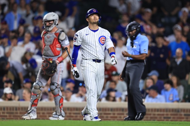 Seiya Suzuki #27 of the Chicago Cubs strikes out during the ninth inning against the Cincinnati Reds at Wrigley Field on Aug. 4, 2025 in Chicago, Illinois. (Photo by Geoff Stellfox/Getty Images)