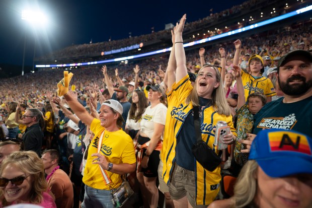 Savannah Bananas fans cheer during a game against the Party Animals at Memorial Stadium, home of the Clemson Tigers, on April 26, 2025, in Clemson, S.C. A crowd of 81,000 attended the game, the first at a college football stadium. (Sean Rayford/Getty Images)