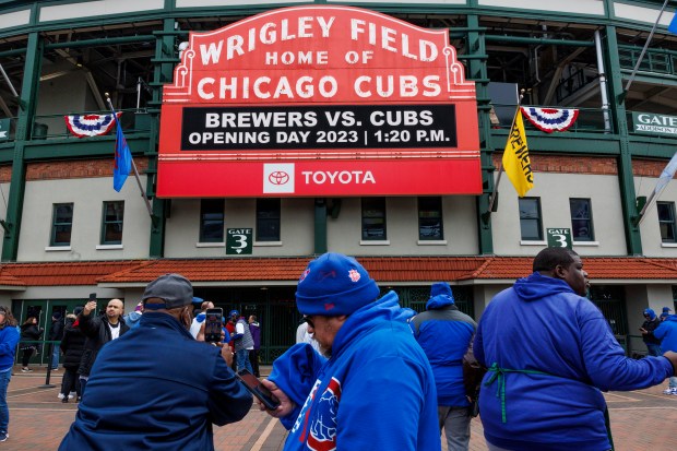 Fans walk outside before the Chicago Cubs play the Milwaukee Brewers at Wrigley Field on opening day Thursday, March 30, 2023, in Chicago. (Armando L. Sanchez/Chicago Tribune)