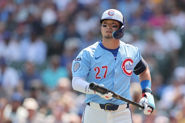 Cubs right fielder Seiya Suzuki walks to the dugout after striking out against the Pirates during the first inning on Aug. 15, 2025, at Wrigley Field. (Michael Reaves/Getty Images)