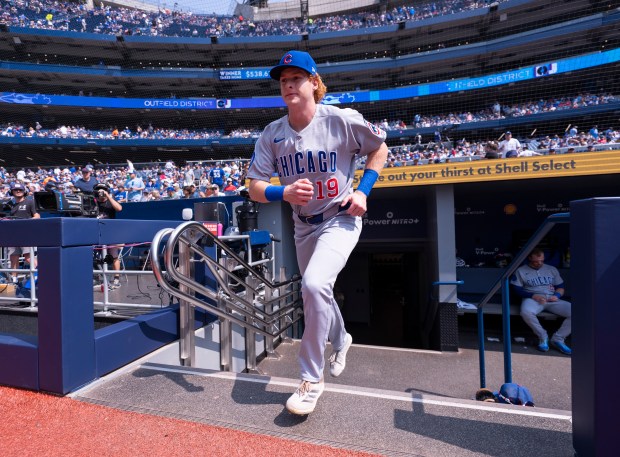 Cubs designated hitter Owen Caissie takes the field for warmups ahead of his major-league debut against the Blue Jays on Aug. 14, 2025, in Toronto. (Mark Blinch/Getty Images)