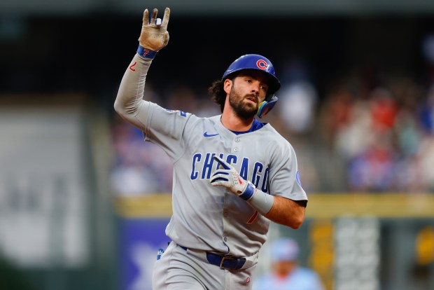 Cubs shortstop Dansby Swanson celebrates as he rounds the bases after hitting a two-run home run in the second inning against the Rockies at Coors Field on Aug. 29, 2025, in Denver. (Justin Edmonds/Getty Images)