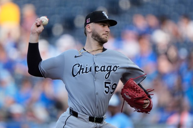 White Sox starter Sean Burke delivers against the Royals in the first inning on Saturday, Aug. 16, 2025, in Kansas City, Mo. (Charlie Riedel/AP)