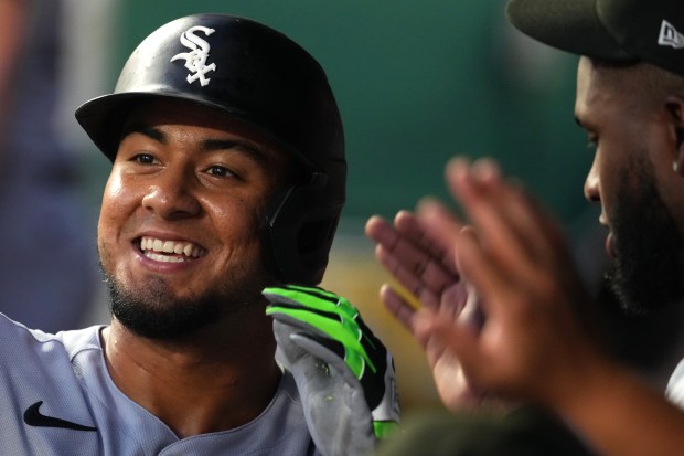 White Sox designated hitter Lenyn Sosa celebrates with teammates in the dugout after hitting a solo home run in the fourth inning against the Royals on Aug. 15, 2025 in Kansas City, Mo. (Ed Zurga/Getty Images)
