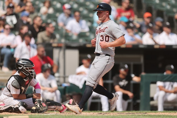 Tigers left fielder Kerry Carpenter scores on a sacrifice fly against the White Sox during the sixth inning on Aug. 13, 2025, at Rate Field. (Michael Reaves/Getty Images)