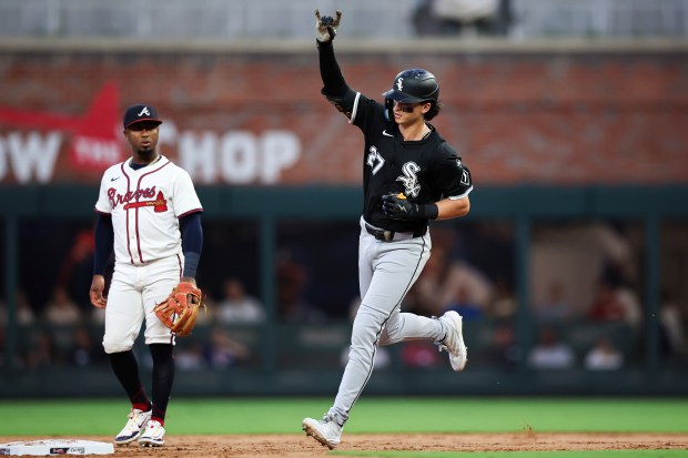 Chicago White Sox's Brooks Baldwin rounds the bases after hitting a home run in the third inning of a baseball game against the Atlanta Braves, Monday, Aug. 18, 2025, in Atlanta. (AP Photo/Colin Hubbard)