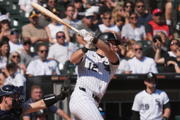 Chicago White Sox's Colson Montgomery hits a solo home run during the sixth inning of a baseball game against the New York Yankees in Chicago, Sunday, Aug. 31, 2025. (AP Photo/Nam Y. Huh)