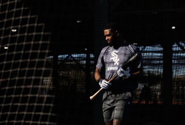 White Sox outfielder Luis Robert Jr. walks in a batting...