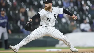 May 19, 2025; Chicago, Illinois, USA; Chicago White Sox relief pitcher Cam Booser (71) delivers a pitch against the Seattle Mariners during the eight inning at Rate Field.