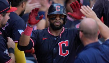 Cleveland Guardians' Carlos Santana celebrates after hitting a two-run home run during the sixth inning of the first baseball game of a doubleheader against the Chicago White Sox, Friday, July 11, 2025, in Chicago.