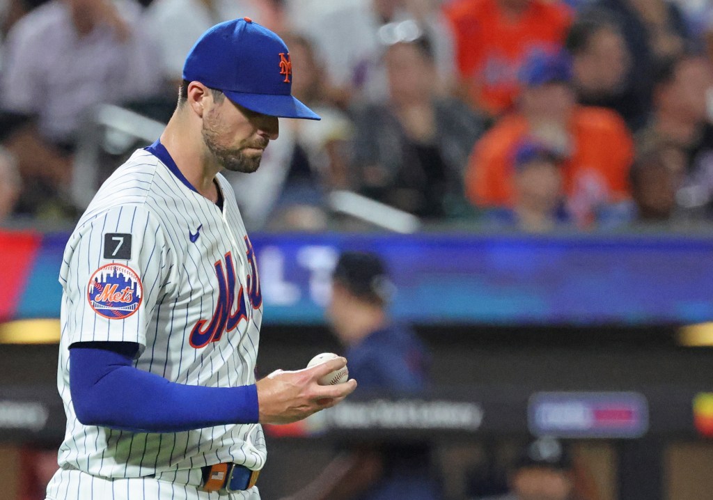 Clay Holmes react dejectedly after giving up an RBI double in the fourth inning of the Mets' 13-5 blowout win over the Braves on Aug. 12, 2025.