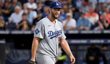 Los Angeles Dodgers pitcher Clayton Kershaw walks towards the dugout after striking Tampa Bay Rays' Nick Fortes (not picture) to end the second inning during a baseball game Friday, Aug. 1, 2025, in Tampa, Fla. (AP Photo/Jason Behnken)