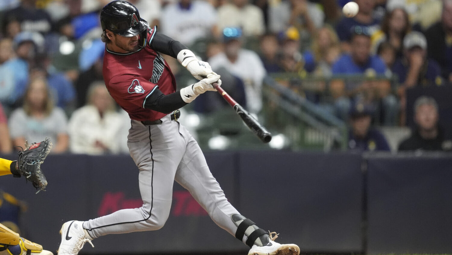 Arizona Diamondbacks' Blaze Alexander hits a two-run home run during the sixth inning of a baseball...