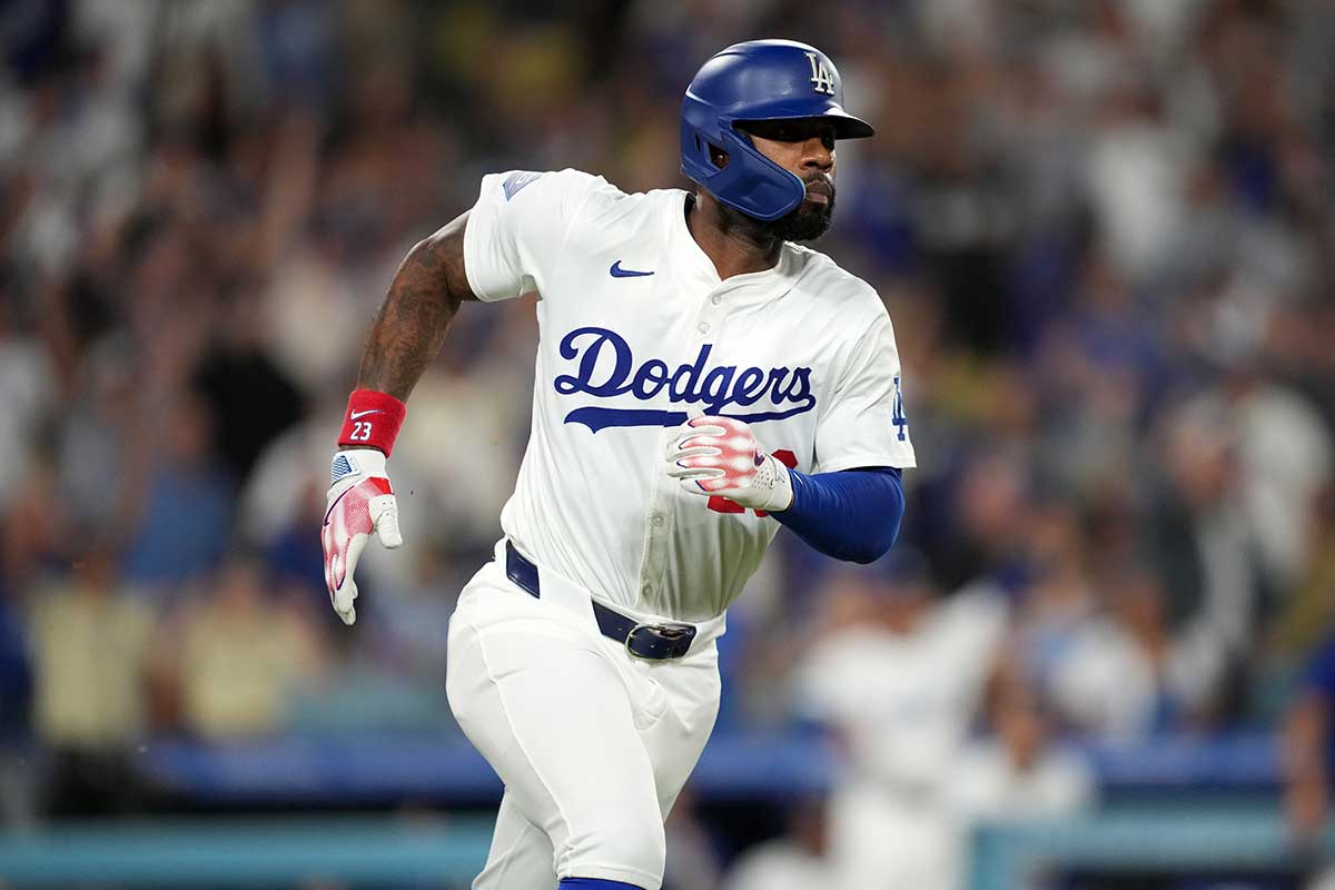 Los Angeles Dodgers right fielder Jason Heyward (23) runs the bases after hitting a three-run home run in the eighth inning against the Seattle Mariners at Dodger Stadium.