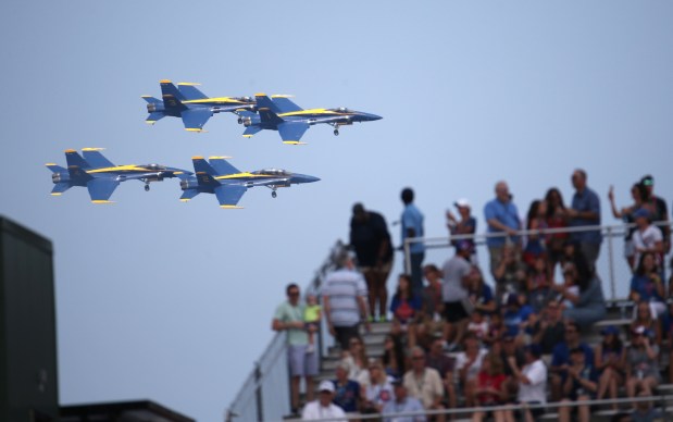The Blue Angels fly over the rooftops during the Air and Water Show while the Cubs play Aug. 20, 2017, at Wrigley Field. (Brian Cassella/Chicago Tribune)