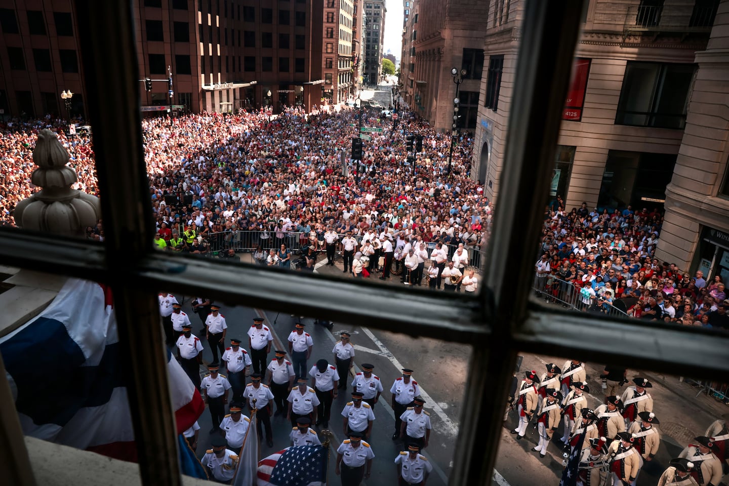 The parade arrived at the Old State House for the reading of the Declaration of Independence during the 249th Independence Day celebration in Boston on July 4.