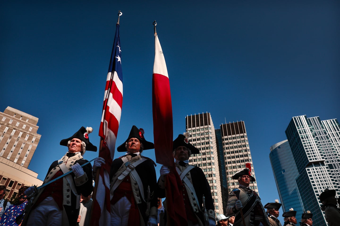 Members of the Middlesex County Volunteers Fifes & Drums stood at attention during the opening ceremony of the 249th Independence Day celebration at City Hall Plaza in Boston on July 4.