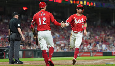 CINCINNATI, OHIO - JULY 31: Matt McLain #9 of the Cincinnati Reds celebrates scoring a with Austin Hays #12 of the Cincinnati Reds during the eighth inning against the Atlanta Braves at Great American Ball Park on July 31, 2025 in Cincinnati, Ohio. (Photo by Jason Mowry/Getty Images)