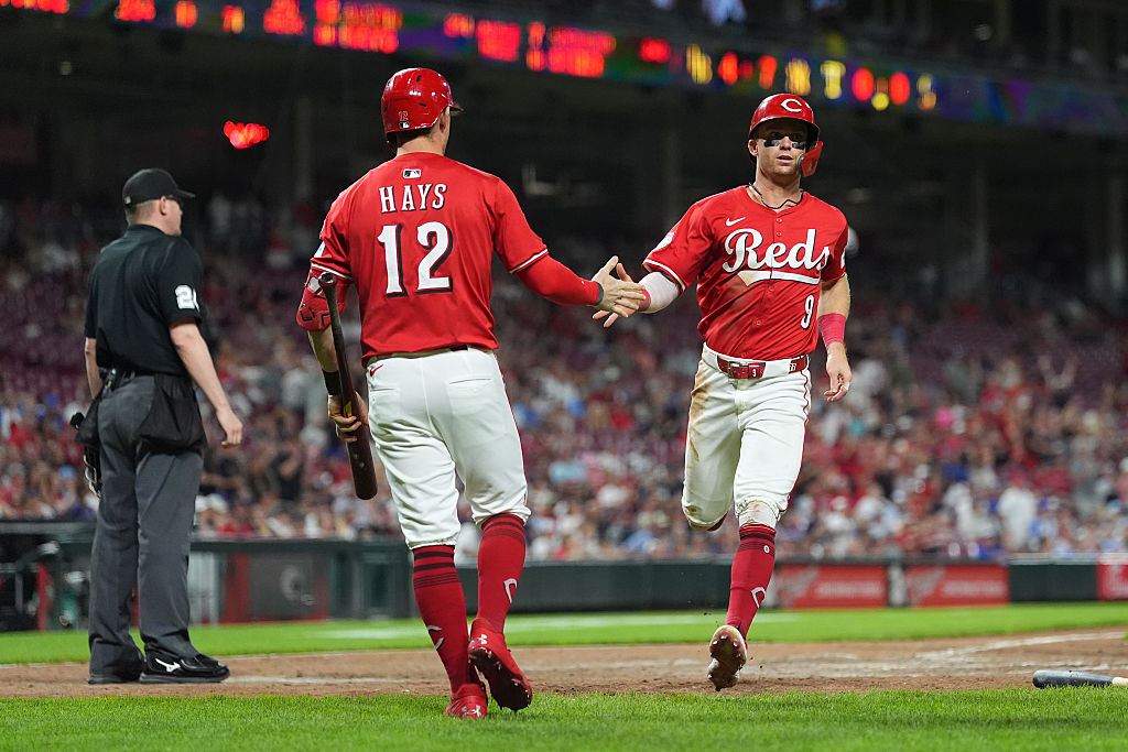 CINCINNATI, OHIO - JULY 31: Matt McLain #9 of the Cincinnati Reds celebrates scoring a with Austin Hays #12 of the Cincinnati Reds during the eighth inning against the Atlanta Braves at Great American Ball Park on July 31, 2025 in Cincinnati, Ohio. (Photo by Jason Mowry/Getty Images)