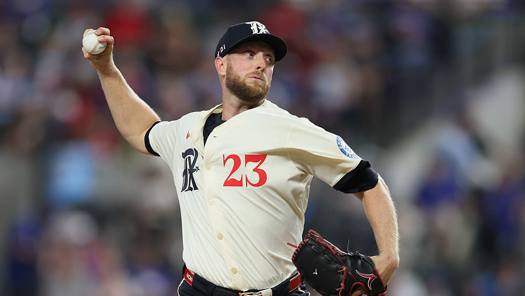 Merrill Kelly #23 of the Texas Rangers...