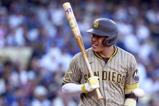 San Diego Padres star Manny Machado reacts to a pitch...
