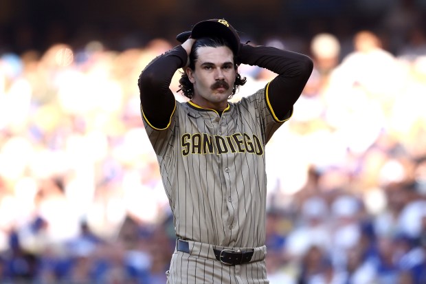 San Diego Padres starting pitcher Dylan Cease reacts on the...