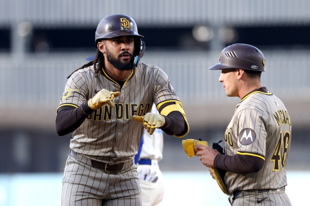 San Diego Padres star Fernando Tatis Jr. gestures after hitting...