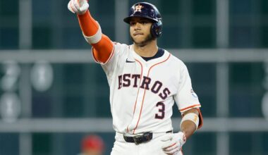 Who becomes the odd man out in the Houston Astros infield with the addition of Carlos Correa?