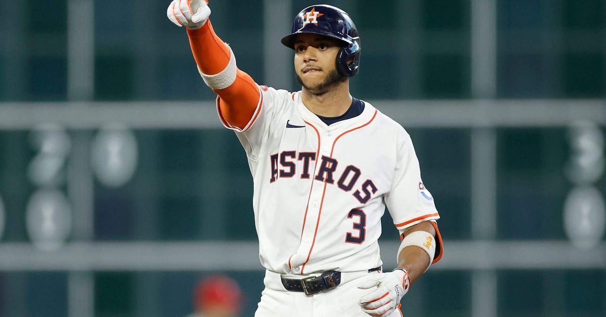Who becomes the odd man out in the Houston Astros infield with the addition of Carlos Correa?