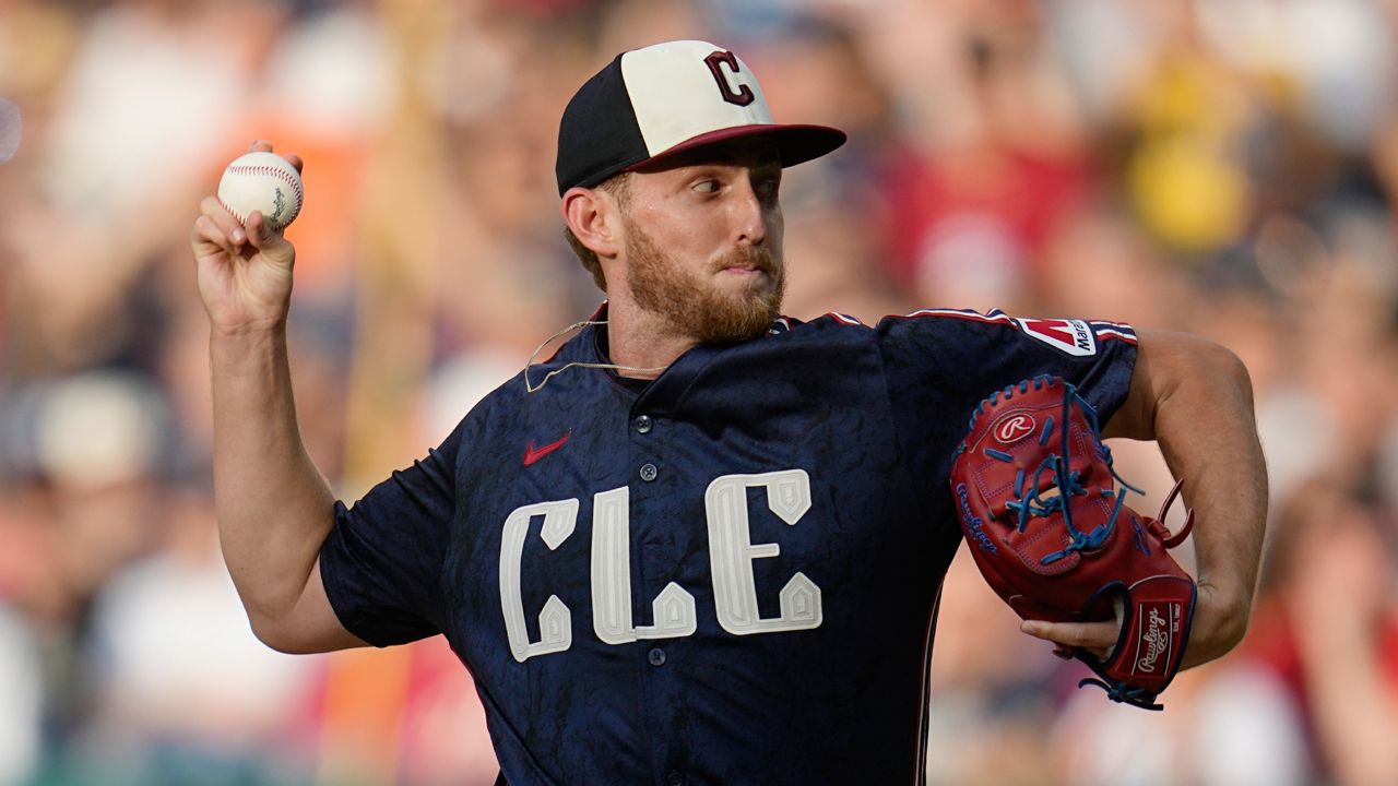 Cleveland Guardians' Tanner Bibee pitches in the first inning of a baseball game against the San Francisco Giants, Friday, July 5, 2024, in Cleveland. (AP File Photo/Sue Ogrocki)