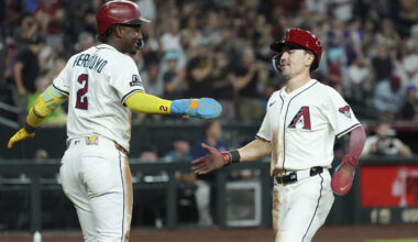 Arizona Diamondbacks' Geraldo Perdomo (2) and Corbin Carroll...