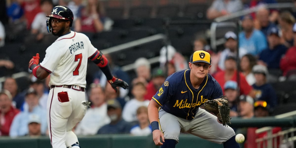 Peralta throws 5 strong innings as Brewers manhandle Braves 7-2 to improve best record in majors