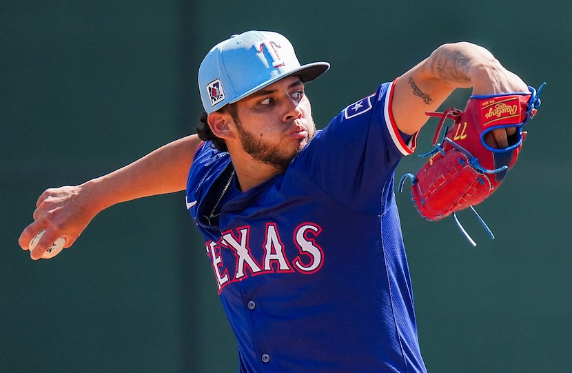 Texas Rangers minor league pitcher David Davalillo throws live batting practice during a...