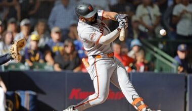 San Francisco Giants' Heliot Ramos hits a two-run single during the ninth inning of a baseball game against the Milwaukee Brewers, Sunday, Aug. 24, 2025, in Milwaukee.