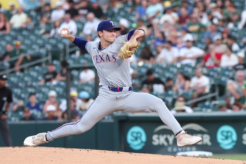 Texas Rangers pitcher Jack Leiter throws to the Athletics during the first inning of a...