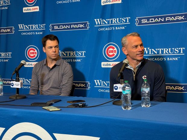 Cubs general manager Carter Hawkins, left, and president of baseball operations Jed Hoyer speak at the start of spring training on Feb. 9, 2025, in Mesa, Ariz. (Meghan Montemurro/Chicago Tribune)