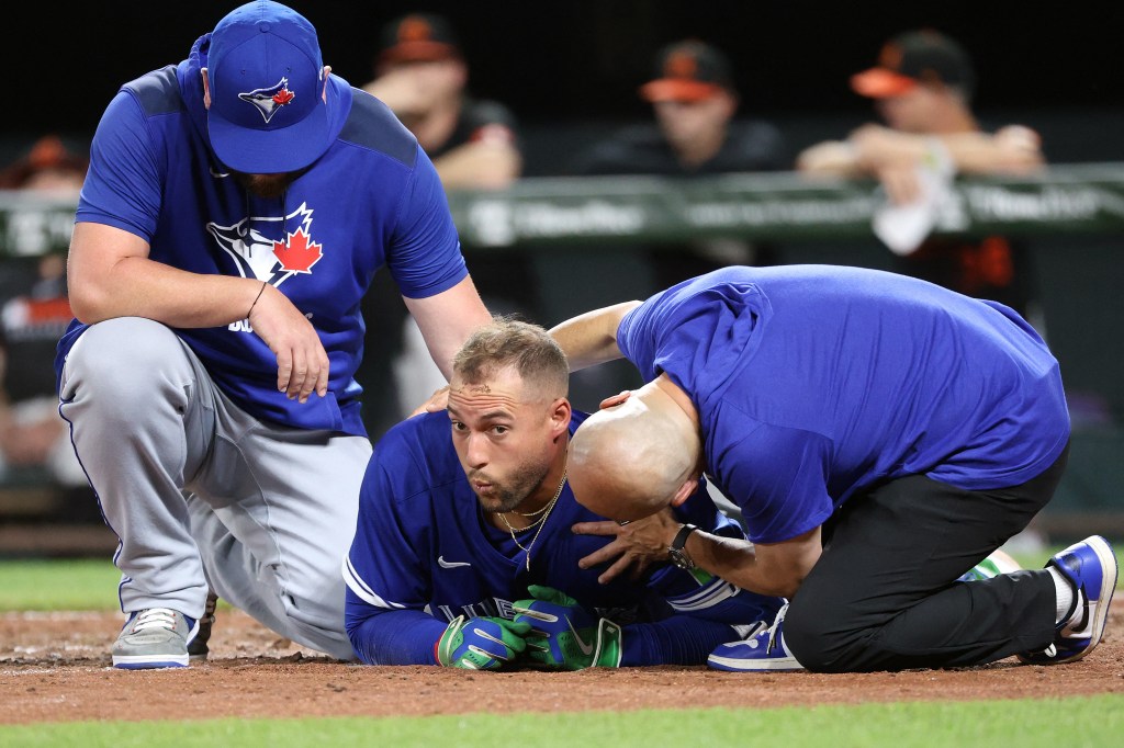 Toronto Blue Jays outfielder George Springer (4) gets hit by a pitch during the ninth inning against the Baltimore Orioles at Oriole Park at Camden Yards. 
