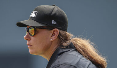 Umpire Jen Pawol, looks on during the first inning of a baseball game of a doubleheader between the...
