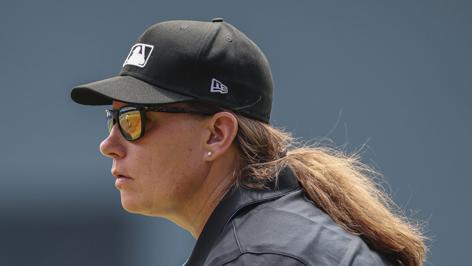 Umpire Jen Pawol, looks on during the first inning of a baseball game of a doubleheader between the...