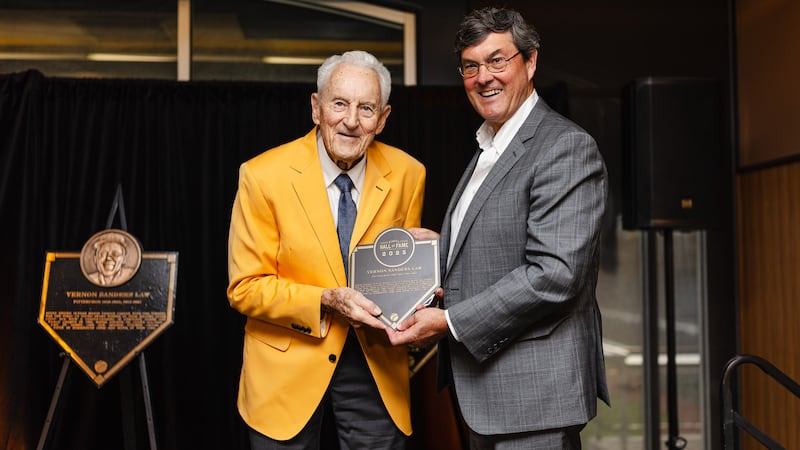 Former Pittsburgh Pirates pitcher Vernon Law, left, poses for a photo with Pirates Chairman of the Board Robert Nutting during Law's induction Thursday, Aug. 21, 2025, into the Pittsburgh Pirates Hall of Fame in Pittsburgh, Pennsylvania.